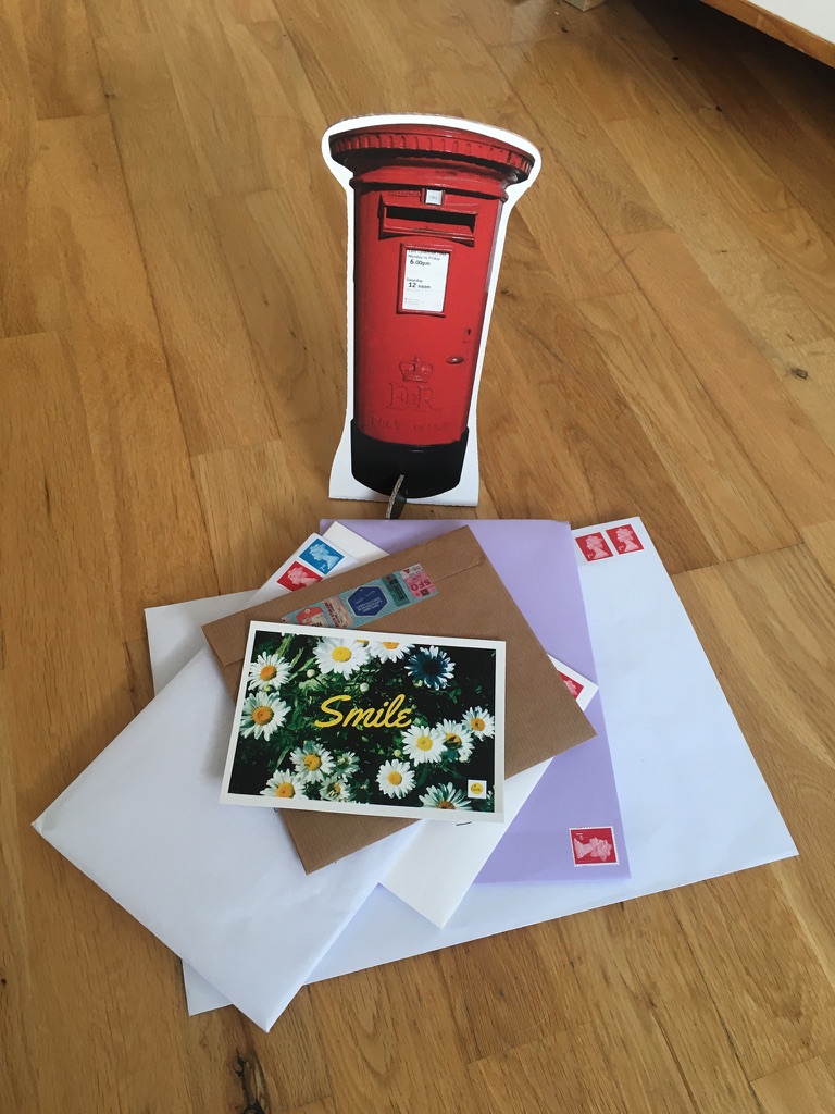 Letters outside a postbox
