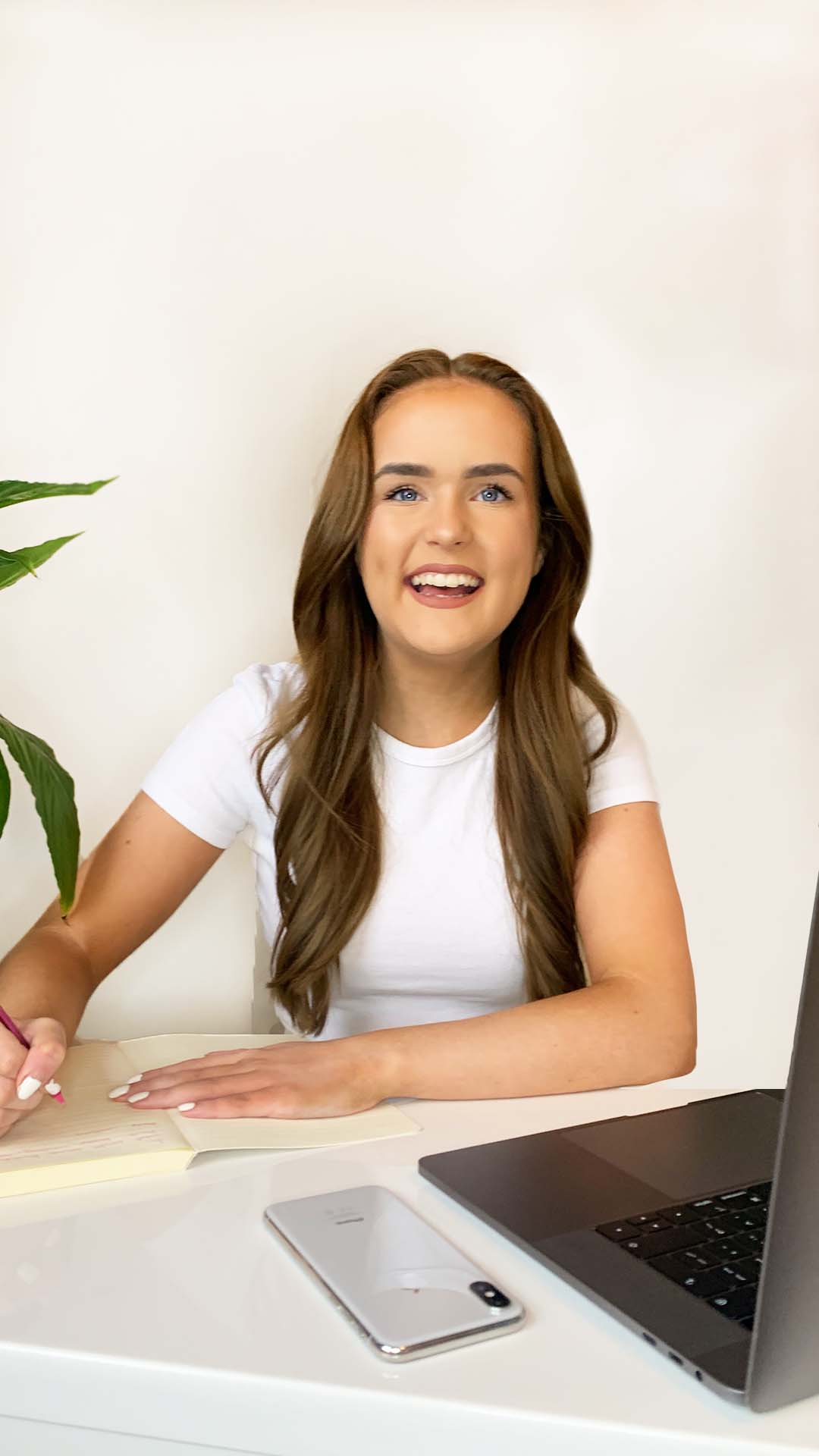 A young woman sat at a desk