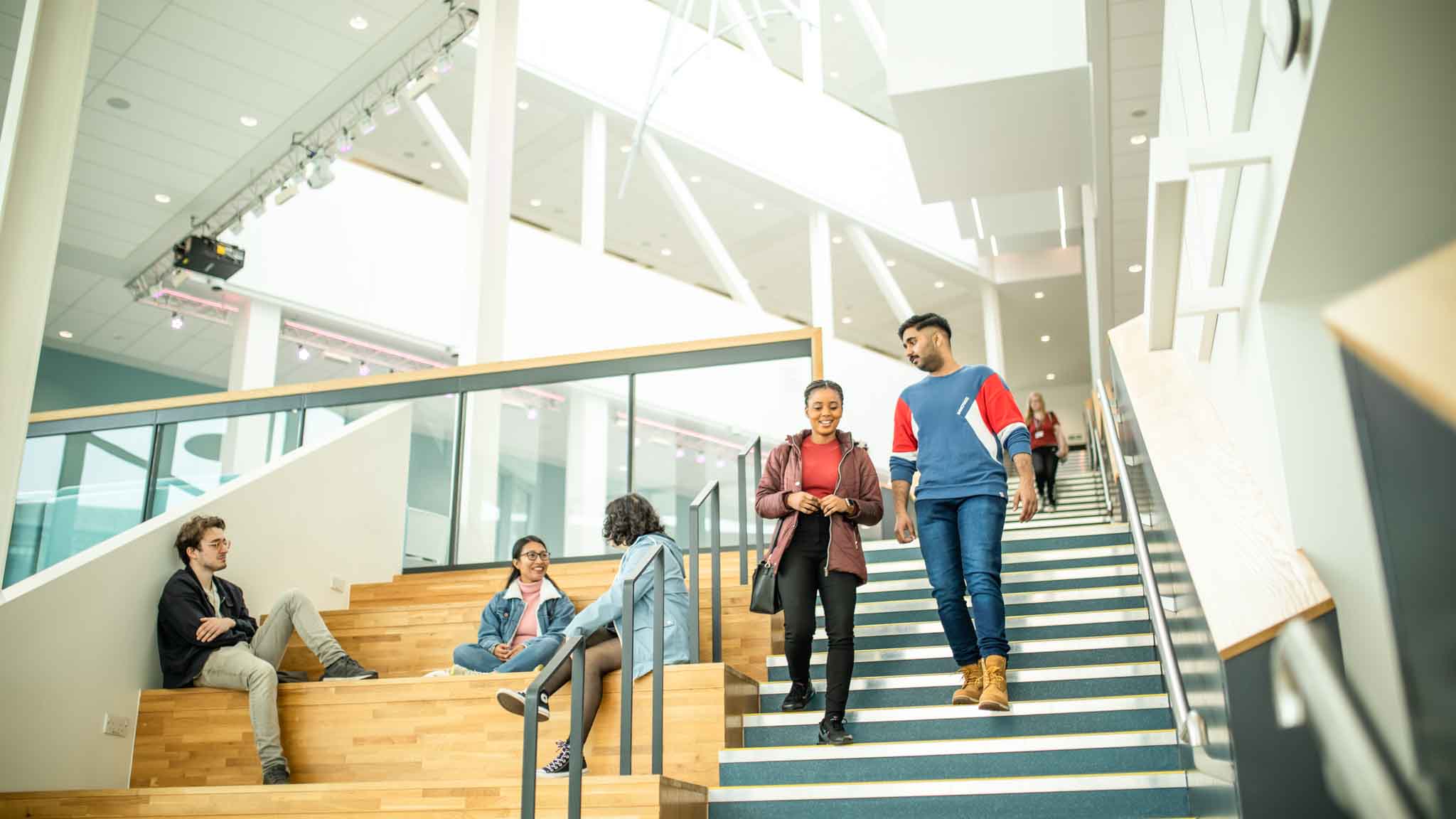 Students on the stairs of the Barbara Hepworth Building
